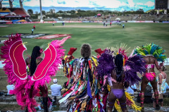 Dancers watching cricket
