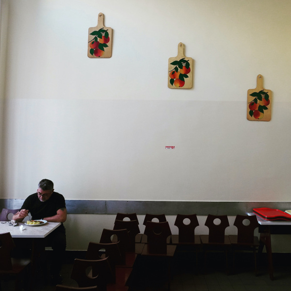Nowa-Huta-Man-in-millkbar-square