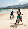 Boys on bikes at Bureh Beach (Peter Moore)