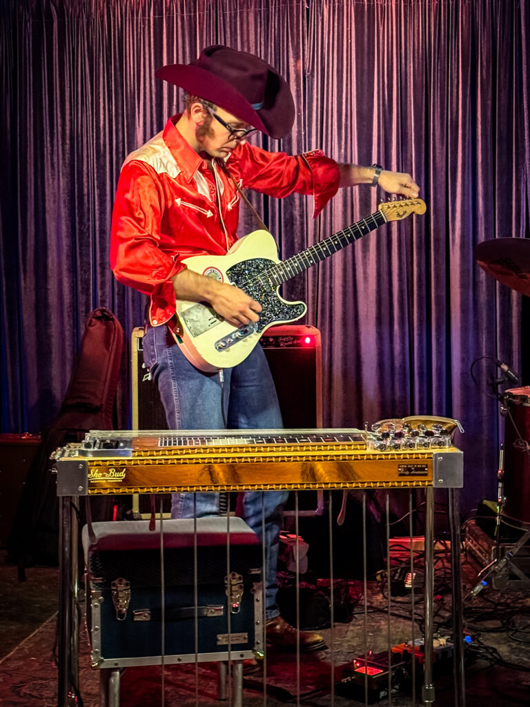 Guitarist from a C&W band playing at The Lonesome Rose. (Peter Moore)