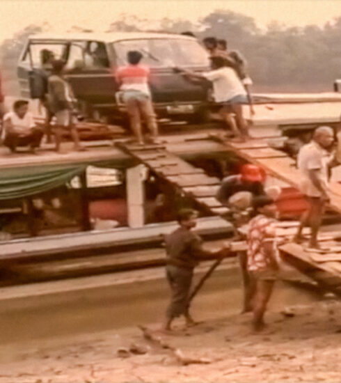 Getting a van off a boat in Indonesia (Peter Moore)