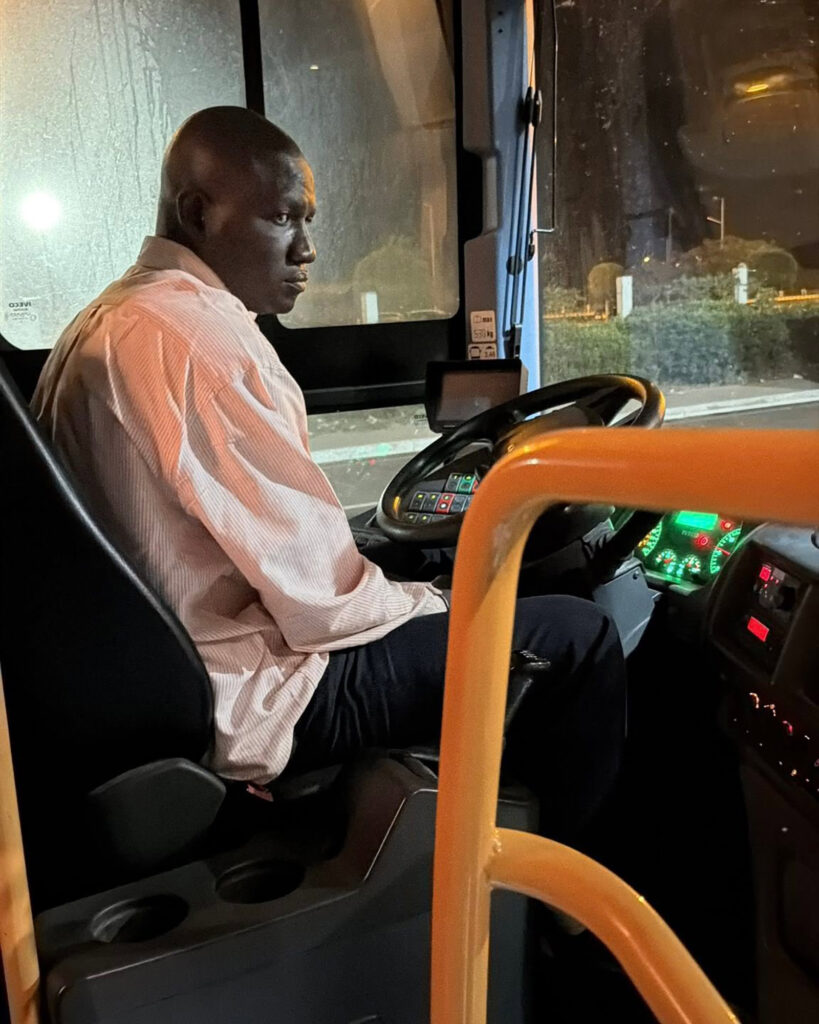Night shift bus driver on the Dem Dikk bus from Dakar Airport (Peter Moore)